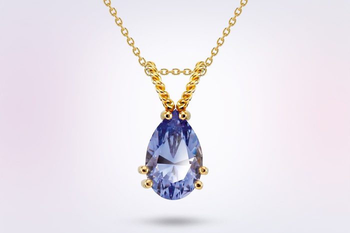Collier aus Gelbgold mit blauem Erinnerungssaphir im Tropfenschliff